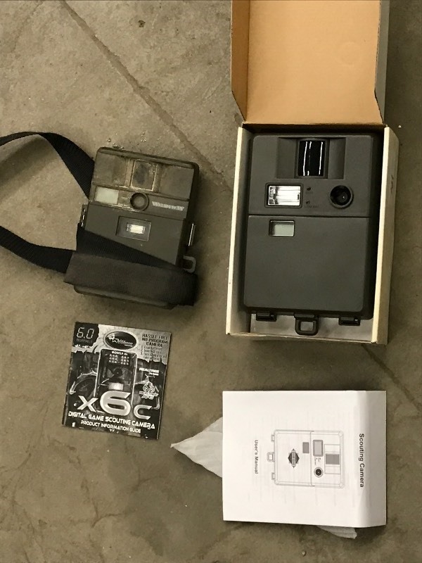 lot 101 image: (2) Unused Guide Gear Trail Cameras...