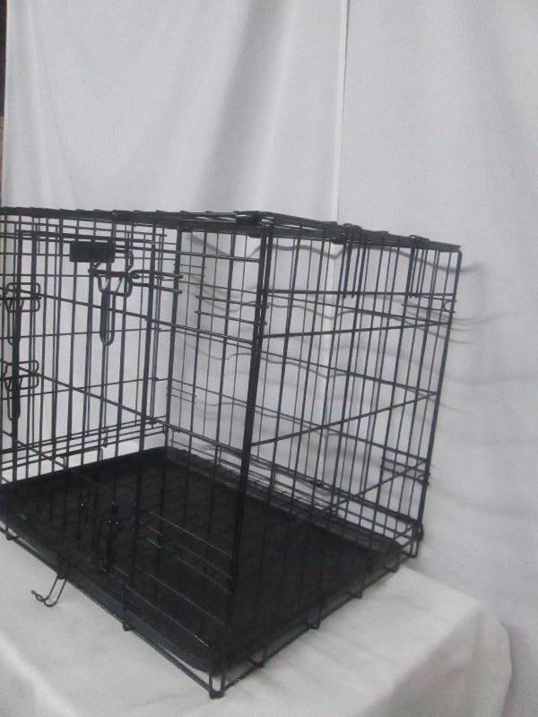 lot 28 image: Petmaker Small 2-Door Foldable Dog Crate Cage