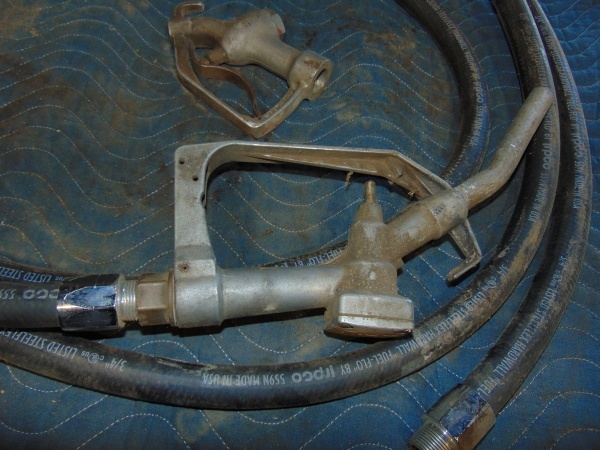 lot 29 image: Gravity Fuel Hose and Nozzle
