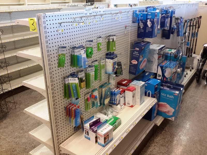 lot 3 image: 4, 48 in w 2 sided shelving units with shelves.