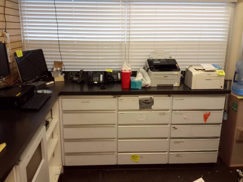 lot 10 image: Pharmacy work area counter as shown.. Drawers, work surface, counter, swing gate glass shelves as shown.  Please inspect