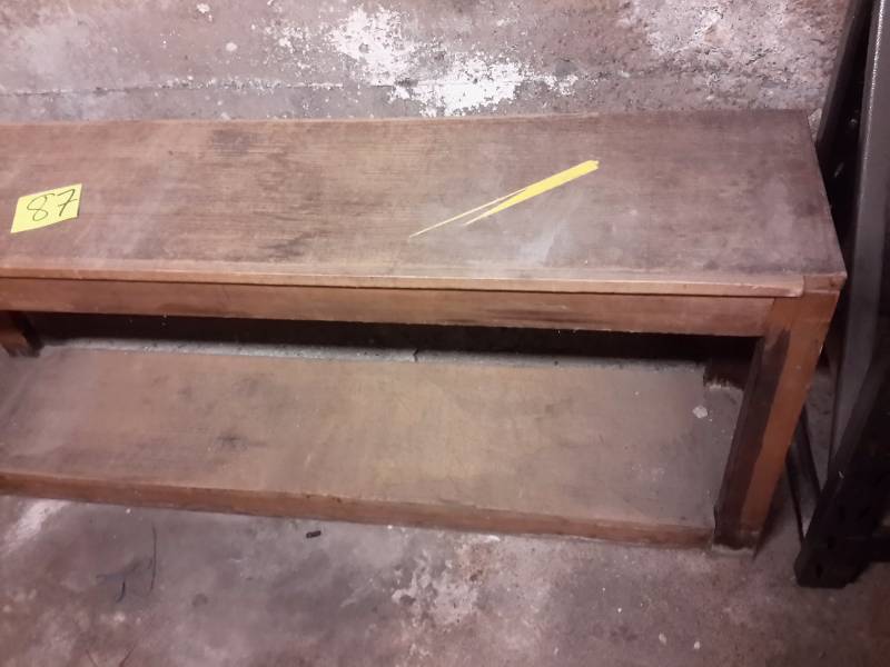 lot 87 image: Solid wood bench..104in x 12in x 23in h.  Looks like it was  a waiting bench.