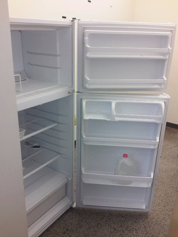lot 101 image: 3 year old Whirlpool Refrigerator Freezer..
