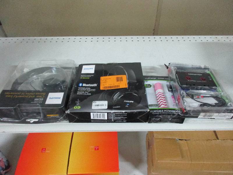 2 phillips head phones  energy shot back up battery  monster brand cassette tape adapter