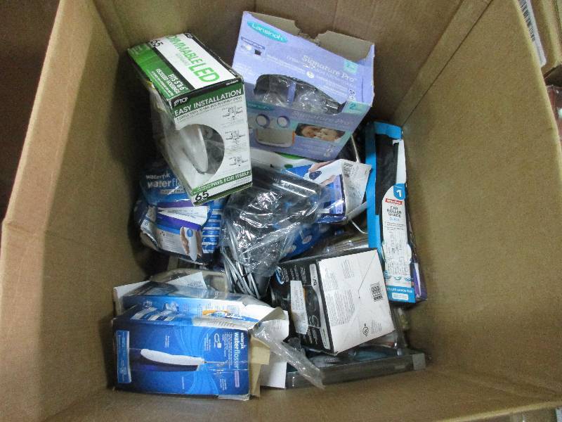 misc box - water flossers - filters - breast pump- vtech phone- sound spa and more