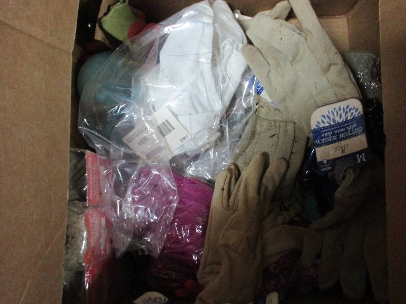 box of garden gloves and plant food