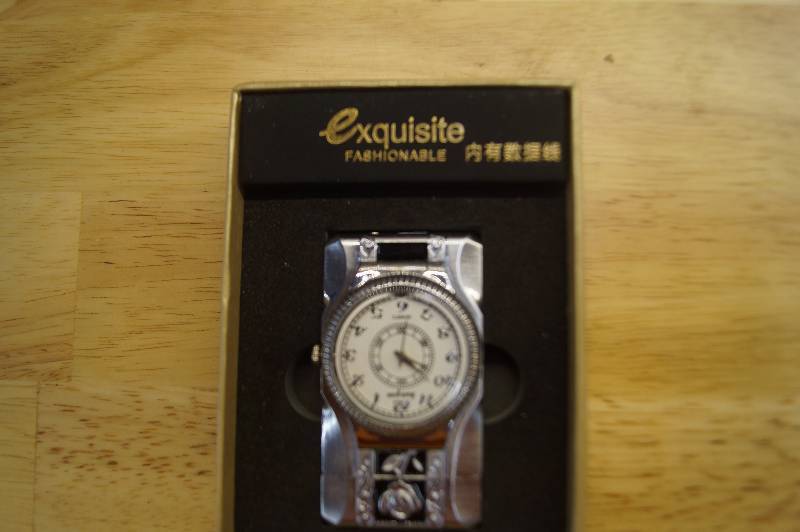 lot 37 image: Watch & Watch Lighter