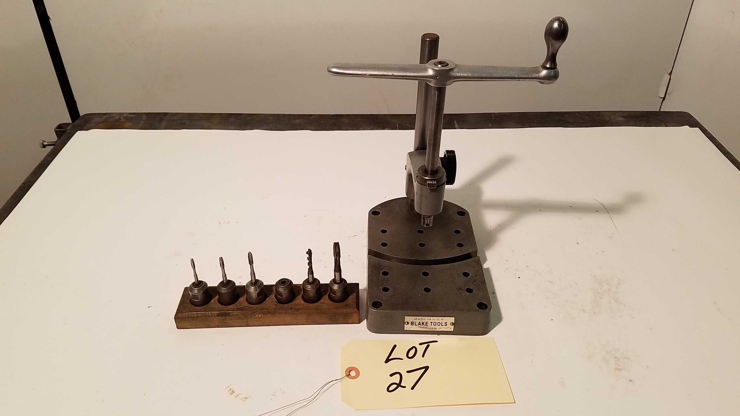lot 27 image: Hand tapper with tap holders