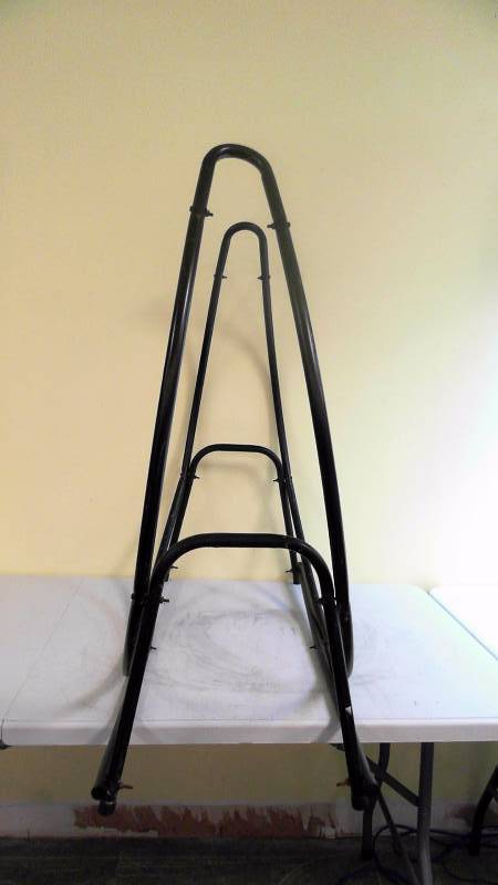 lot 556 image: Unbranded Horseshoe Log Holder