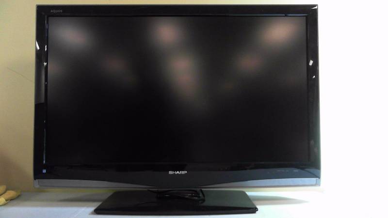 lot 406 image: SHARP AQUOS LC-42D43U 42in 720p LCD HDTV No Remote Doesnt Power On Cracked Screen