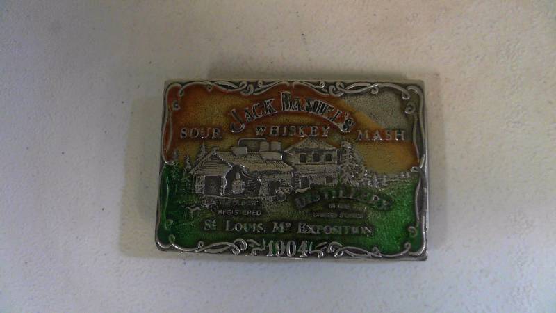 lot 443 image: Jack Daniels Sour Whiskey Mash Distillery St Louis Enamel Belt Buckle