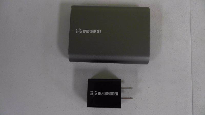 lot 461 image: Random Order Quick Charge 2.0 Portable Charger With Charger No Cord