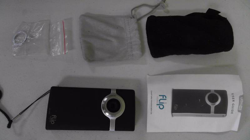 lot 479 image: Flip UltraHD 8GB 3rd Generation Video Camera with Carry Pouches and User Guide