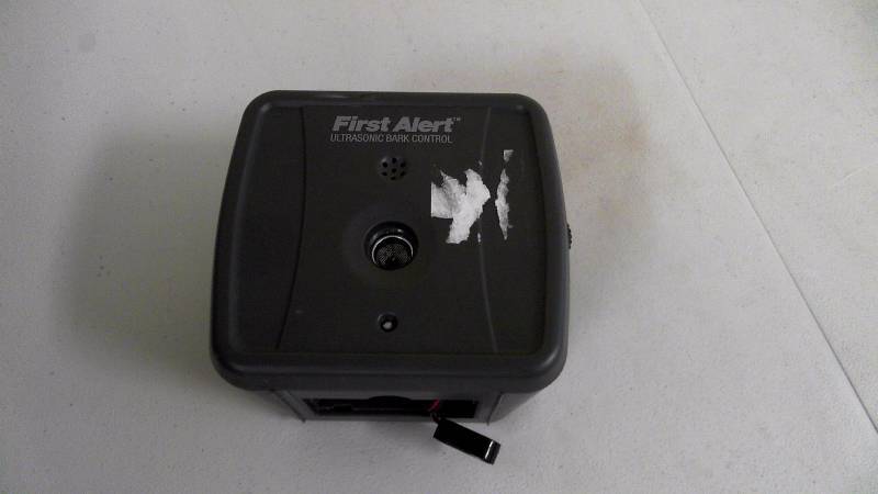 lot 481 image: First Alert Automatic Bark Genie Missing Battery Cover