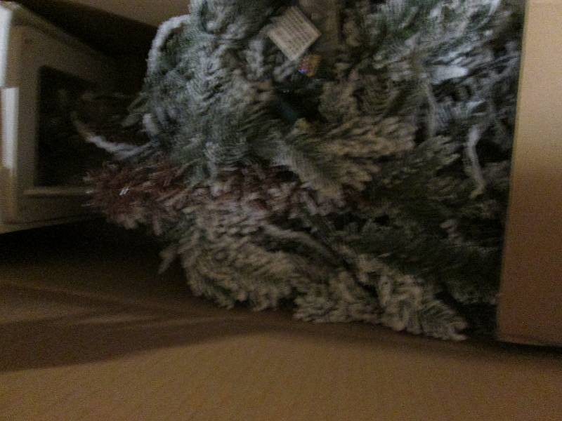 4 Foot Pre-Lit Flocked Proch Tree o...
