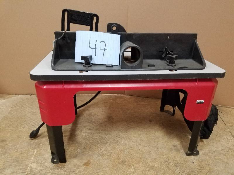 lot 47 image: Skil Router Table with Folding Leg Design and Tall Fence Design