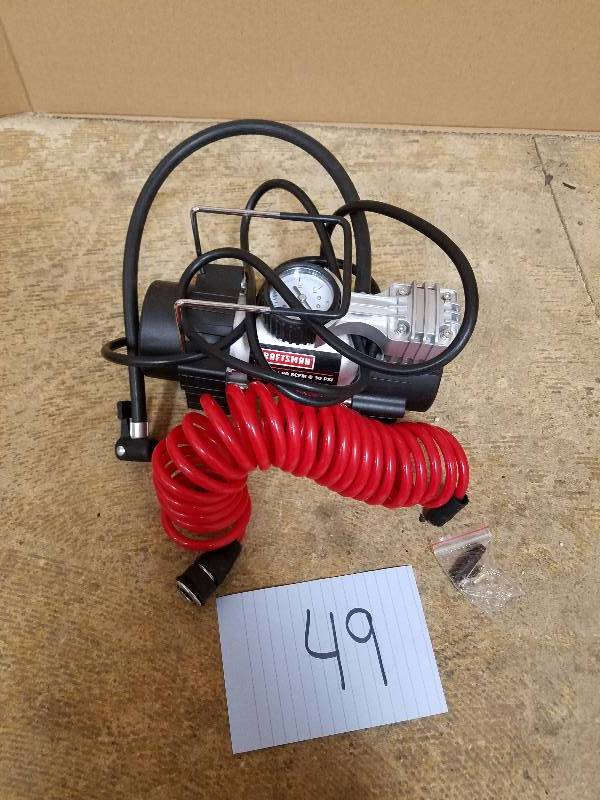 lot 49 image: Craftsman 120V Portable Inflator used in working conditions