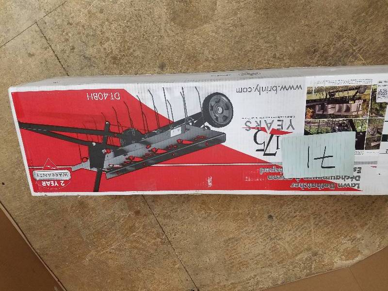 lot 71 image: Brinly-Hardy 40 in. Tow-Behind Dethatcher open box never used