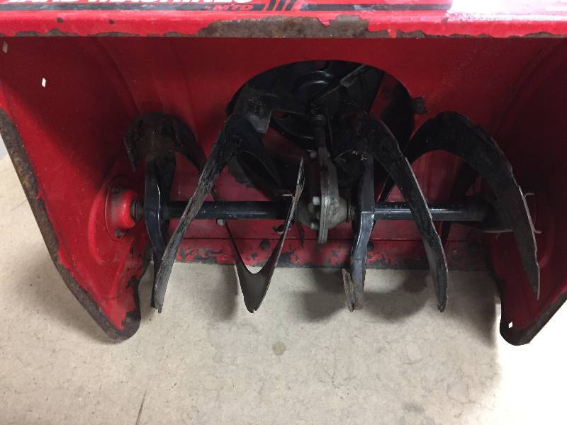 lot 89 image: Yard Machines 24 in. Gas Snow Blower used in working conditions