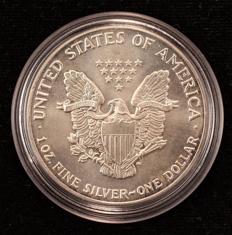 lot 26 image: 1992 AMERICAN SILVER EAGLE 1 TROY Oz. .999 FINE SILVER DOLLAR IN AIRTITE HOLDER