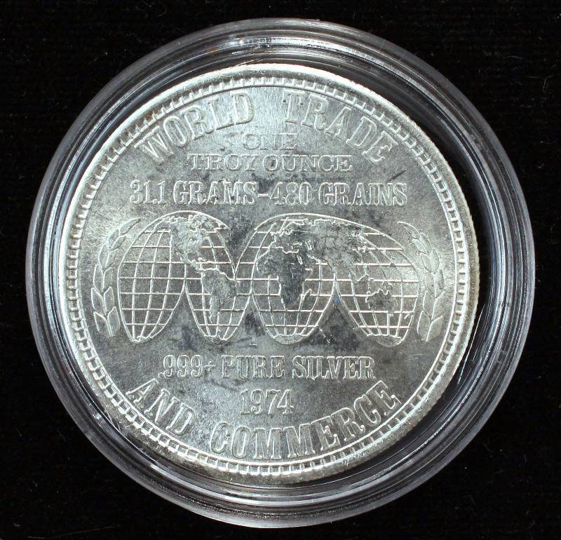 lot 38 image: 1 TROY OZ. .999 FINE SILVER VINTAGE 1974 TRADE & COMMERCE IN AIRTITE