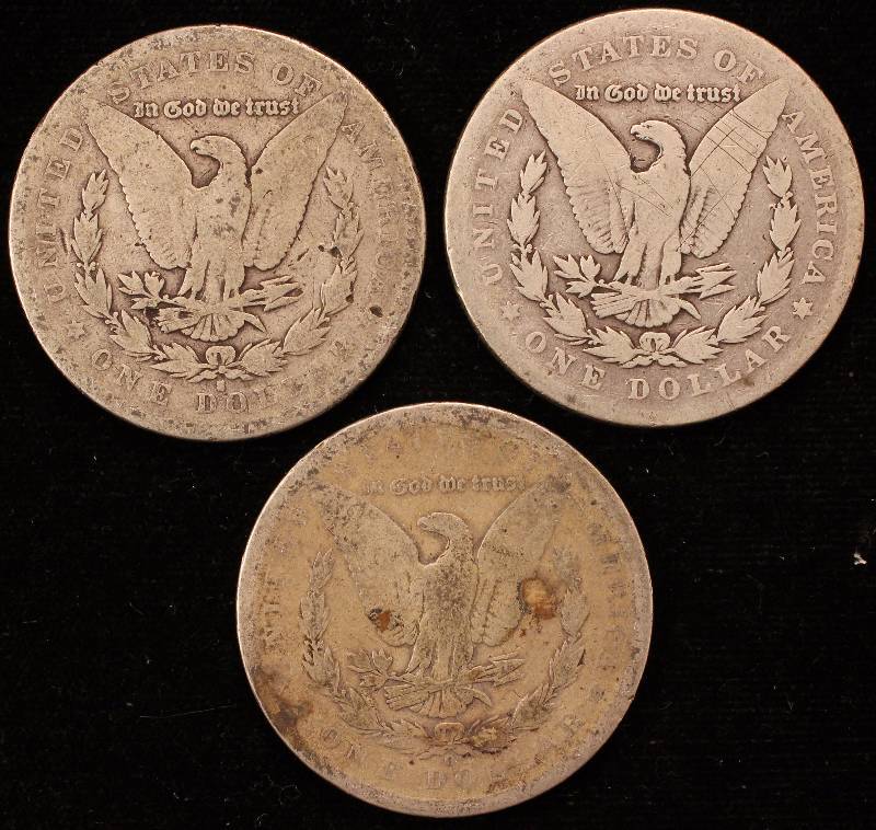 lot 42 image: GROUP OF 3 MORGAN SILVER DOLLARS 1880-S, 1885 & 1891-O