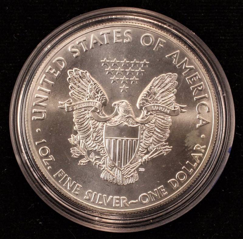 lot 46 image: 2014 AMERICAN SILVER EAGLE 1 TROY OZ. .999 FINE SILVER DOLLAR IN AIRTITE CAPSULE