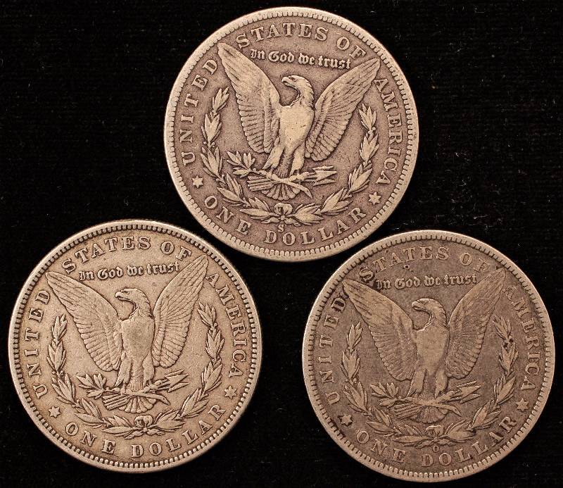 lot 54 image: GROUP OF 3 MORGAN SILVER DOLLARS 1880-S, 1885 & 1886-O VF-XF
