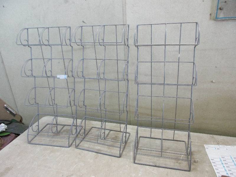 3 metal DVD racks