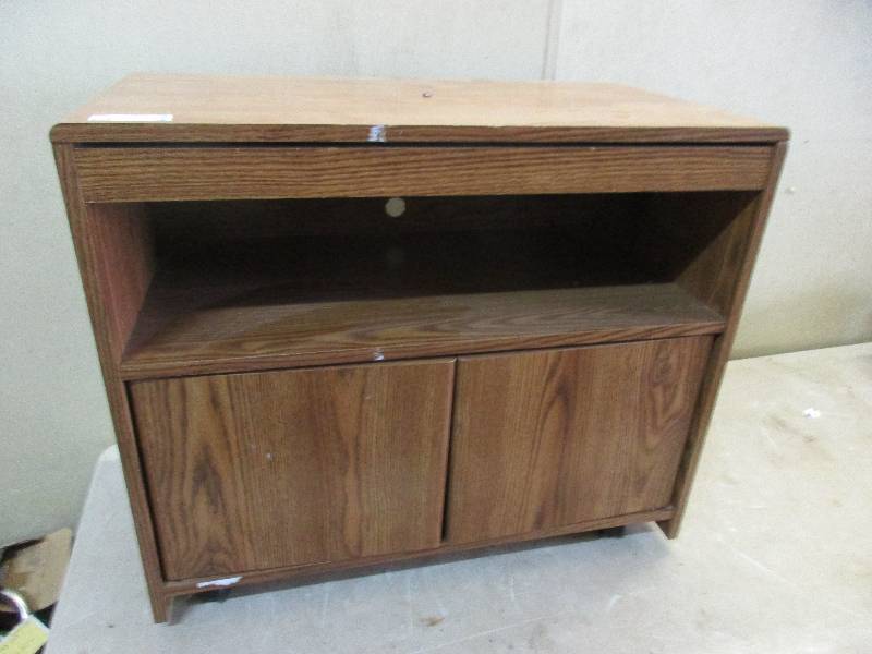 TV stand on wheels w spinning top
