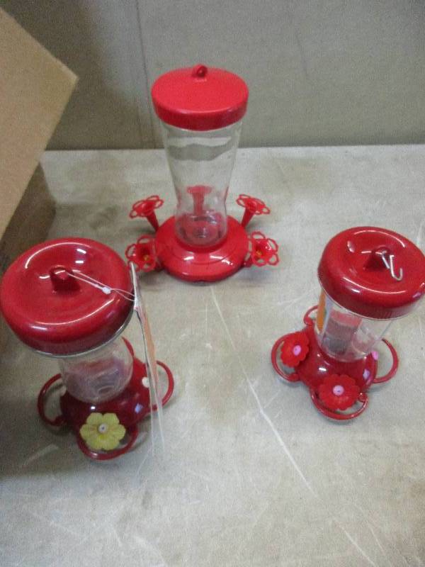 3 humming bird feeders