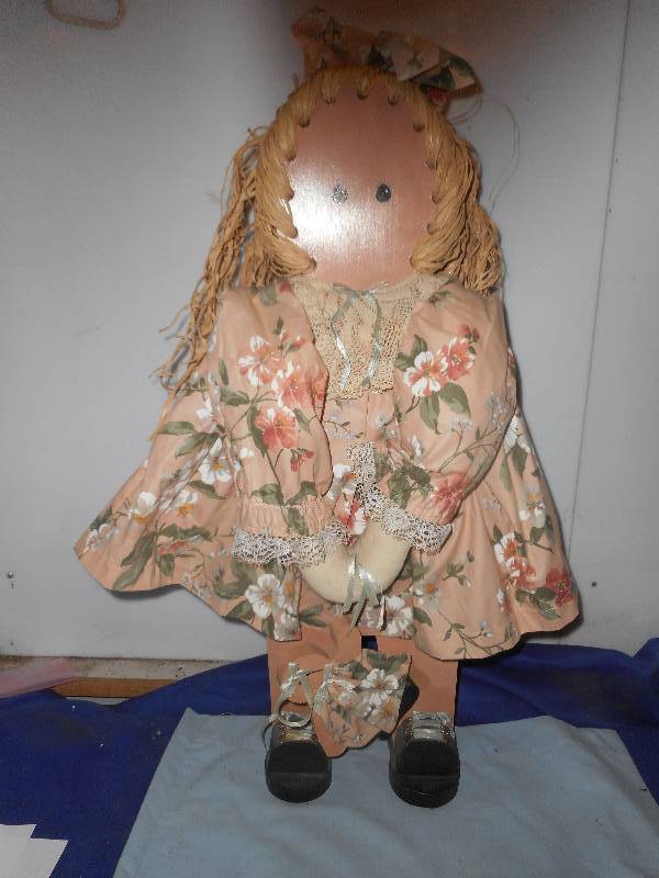 lot 23 image: DECRATIVE WOODEN DOLL