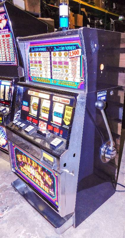 lot 1003 image: IGT TRIPLE DOLLARS REEL SLOT MACHINE