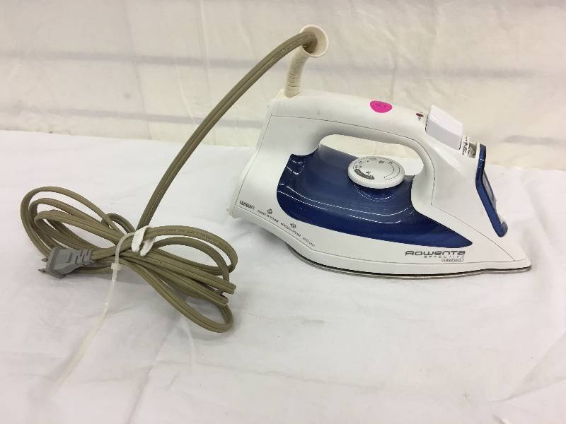 lot 20 image: rolling clothing rack and rowenta iron