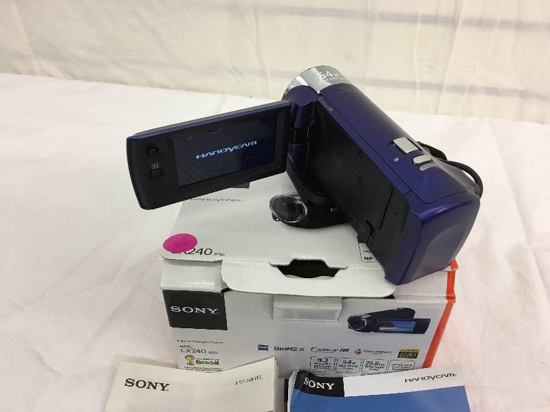 lot 24 image: Sony HDR-CX240L Blue HD Camcorder with 27x Optical Zoom, 2.7 LCD and SteadyShot Image Stabilization retail $199
