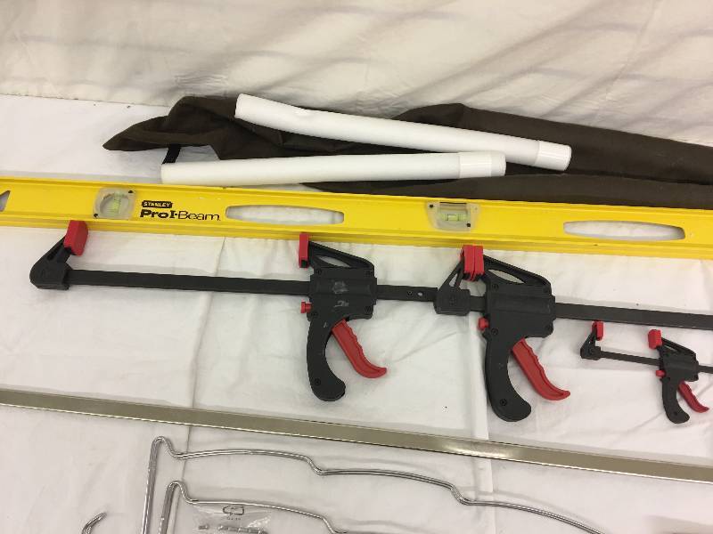 lot 114 image: 4 clamps and stanley level