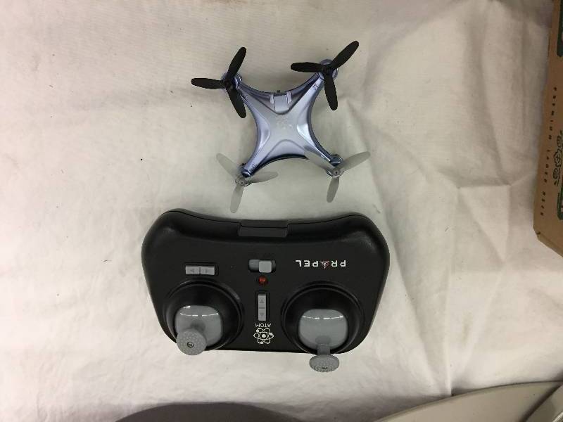 lot 116 image: soap dispenser,mini drone, rotating spice rack