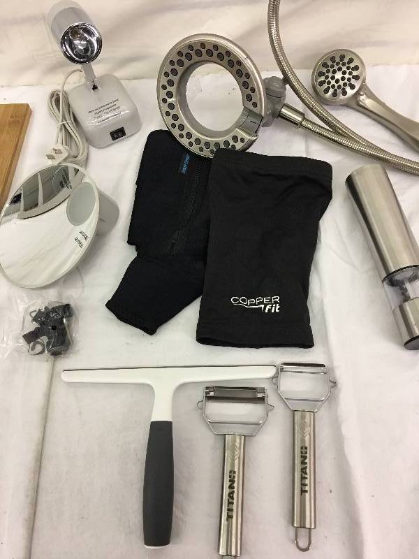 lot 130 image: Floxite Fl-615 15x Supervision Magnifying Mirror Light, White, Frosted White retail $65 and a shower head with wand