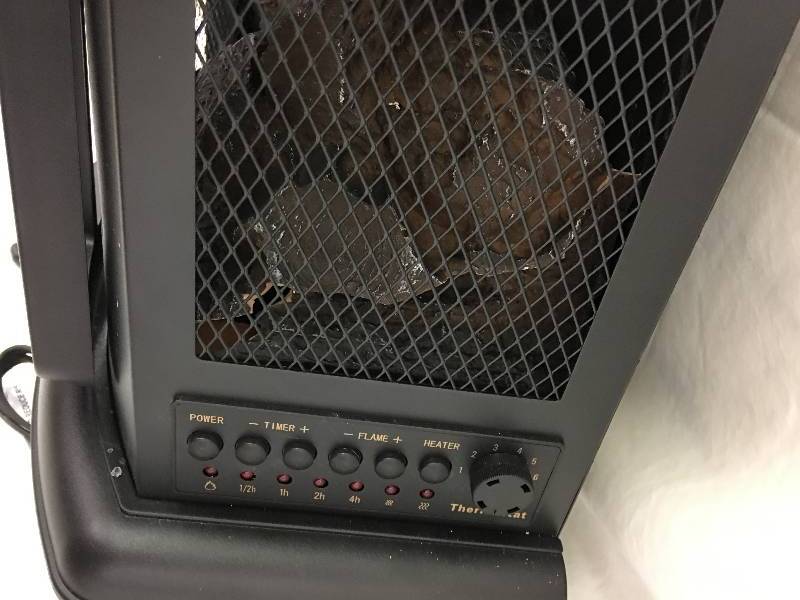 lot 237 image: Randall Electric Stove Heater retail $119