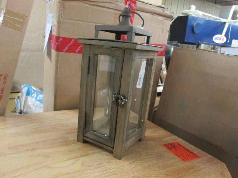 lot 25 image: Stonebriar Collection 12 in. H Rust...