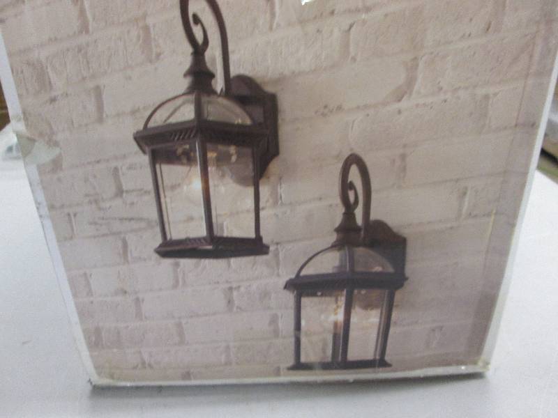 lot 89 image: Hampton Bay Twin Pack 1-Light Weath...