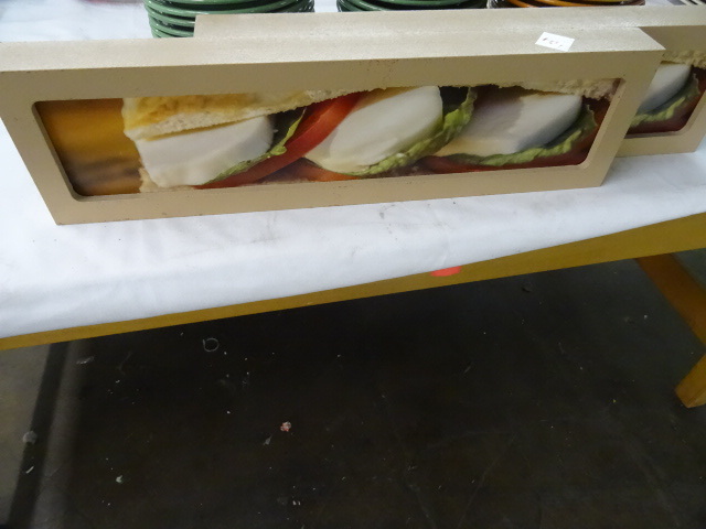 2 pic displays of sandwiches...