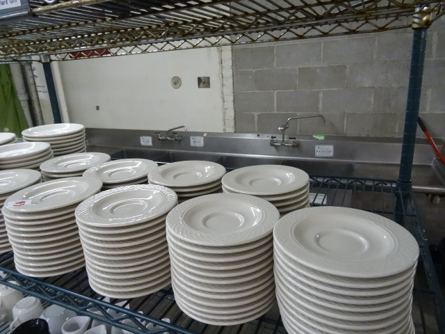 Shelf of misc plates and saucers...
