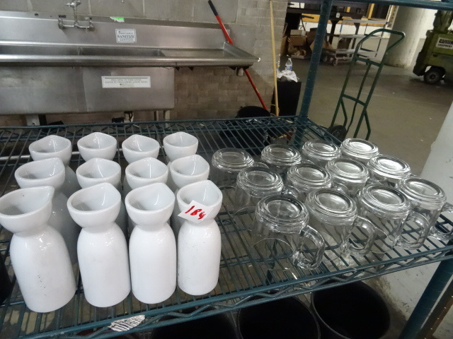 Shelf of misc glassware...