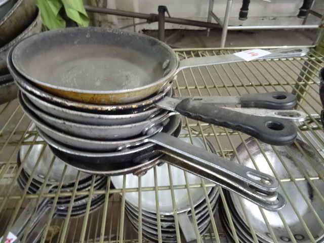 7 sautee pans...