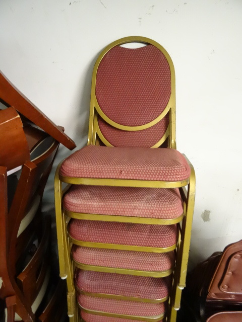 13 metal framed stack chairs. Metal...