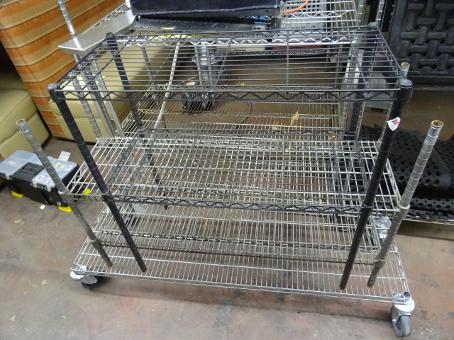 Dunnage rack on wheels. 60 x 18 x 8...