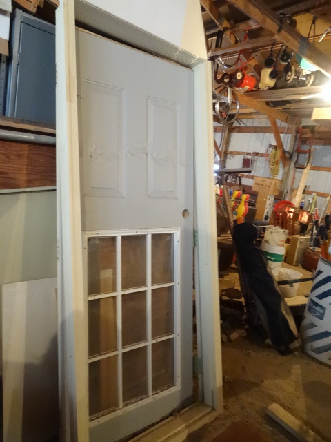 Exterior Door with Frame.  Damage on Lower Panel  32 x 80