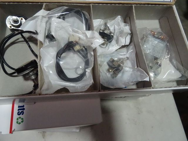 lot 245 image: NEW Box of Momentary and Push Pull Switches. Approx retail $70