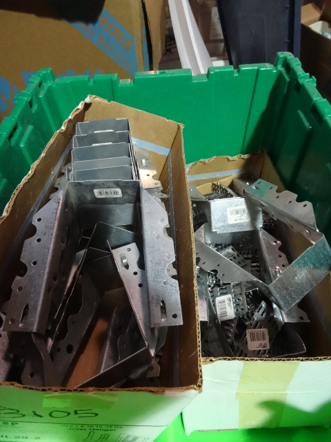 lot 260 image: NEW ENTIRE BIN Construction Fasteners incl approx 20 Joist Hangers 2x81012 approx 50 Truss Plate Fasteners 3.5 x 1.5 in and approx 50 Hurricane Ties 1.5 x 6.5 in. GREEN BIN NOT INCLUDED
